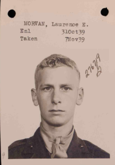 A black and white headshot of a young White man in uniform.