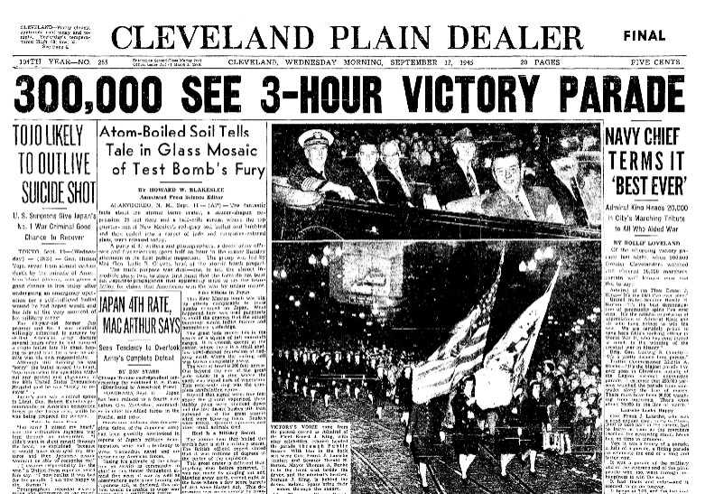 A newspaper article titled “300,000 See 3-Hour Victory Parade.”