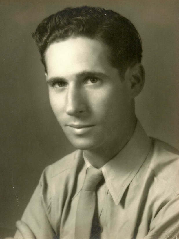 A black and white headshot of a young White man in uniform.