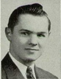A young man in a jacket and tie.