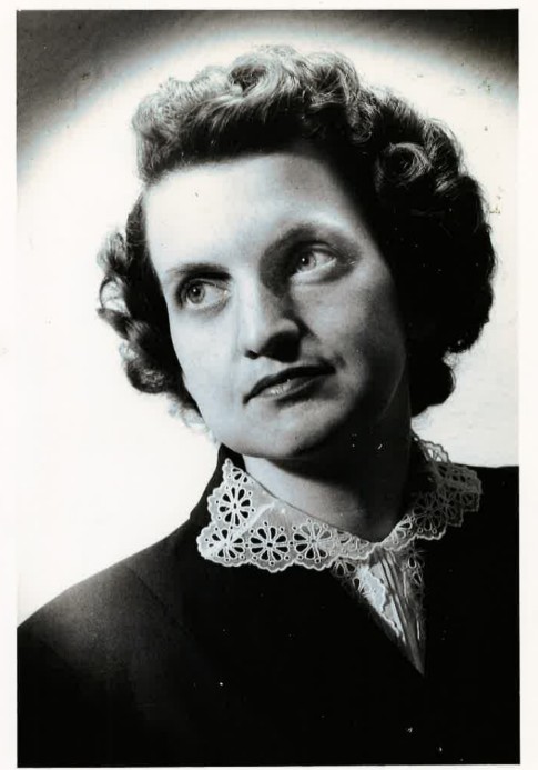 A black and white headshot of a young White woman.