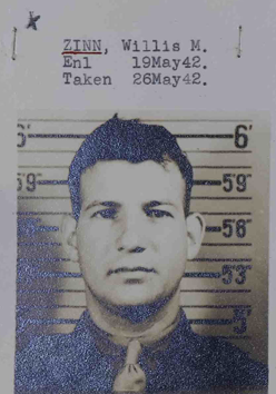 A black and white headshot of a young White man in uniform.